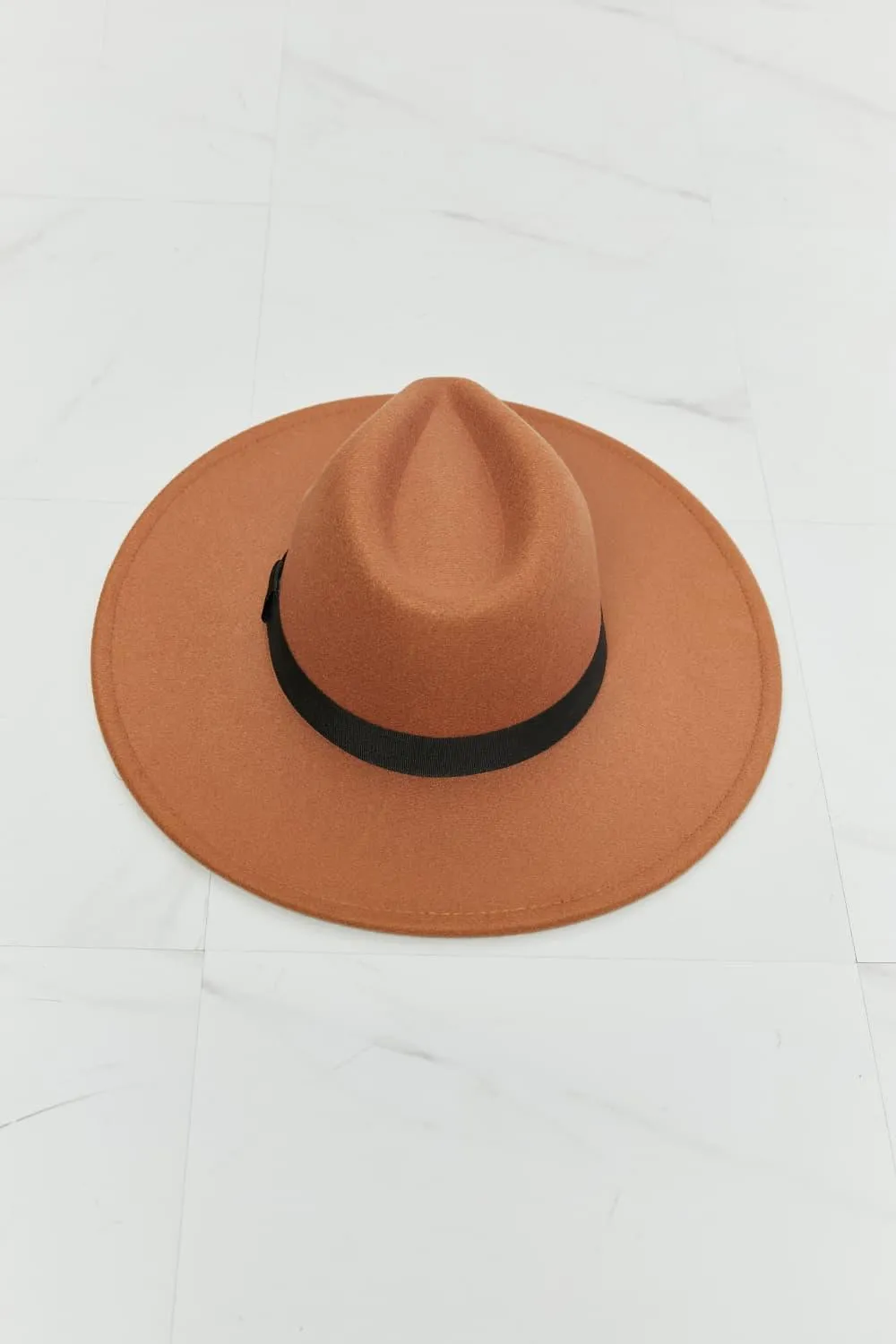 Chic Tan Fedora with Stylish Black Ribbon Accent