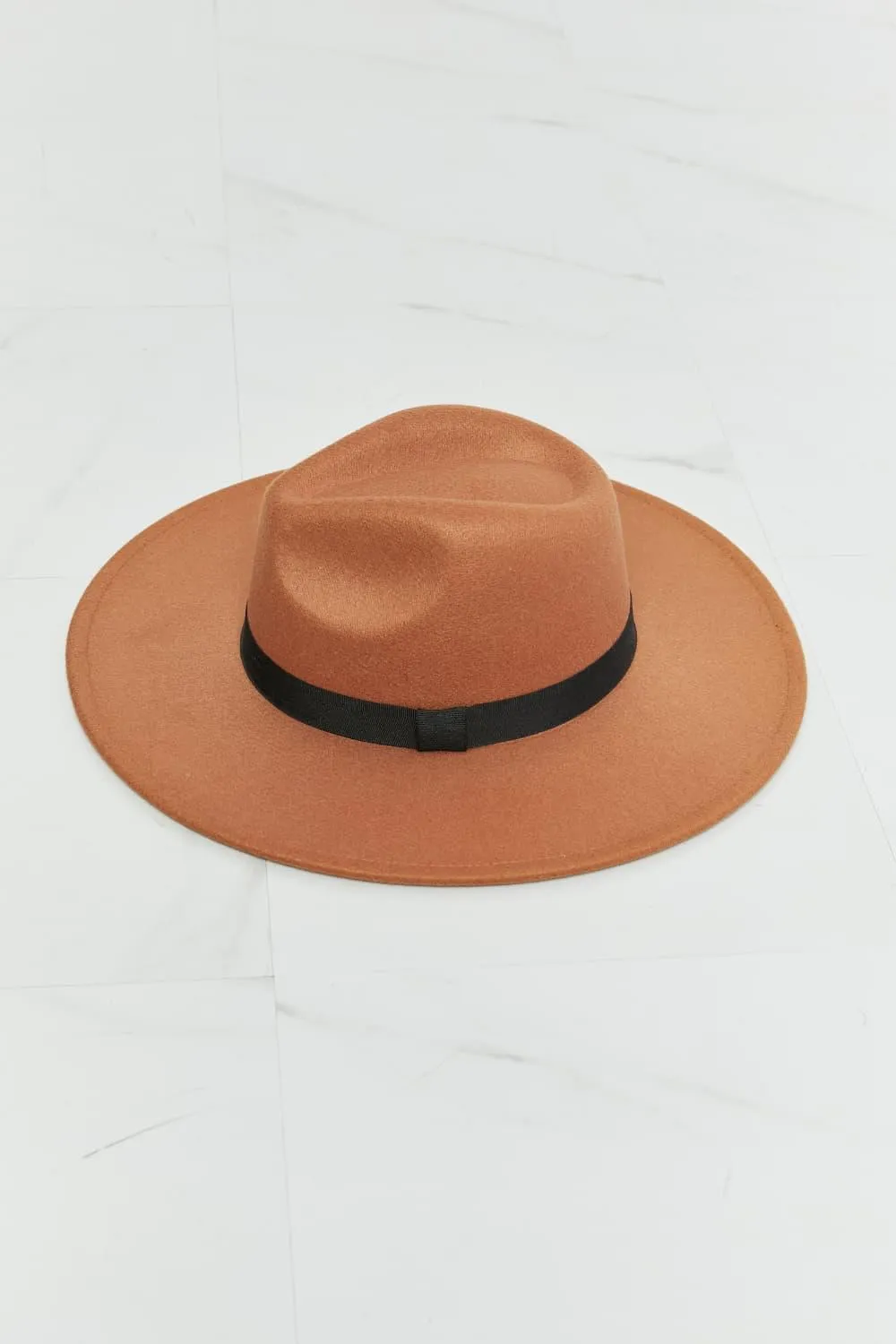 Chic Tan Fedora with Stylish Black Ribbon Accent